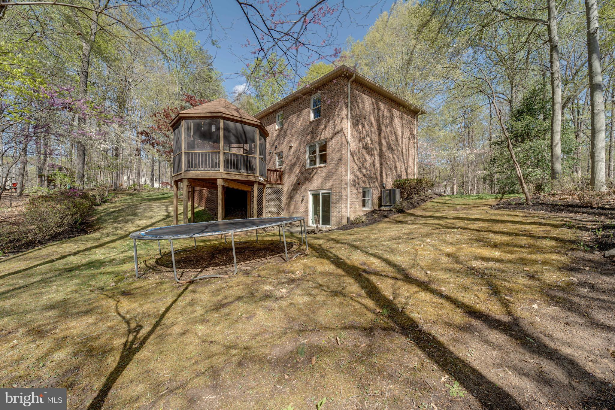 8232 Honeysuckle Road Manassas, VA 20112 - Photo 60 of 76 a front view of a house with a yard