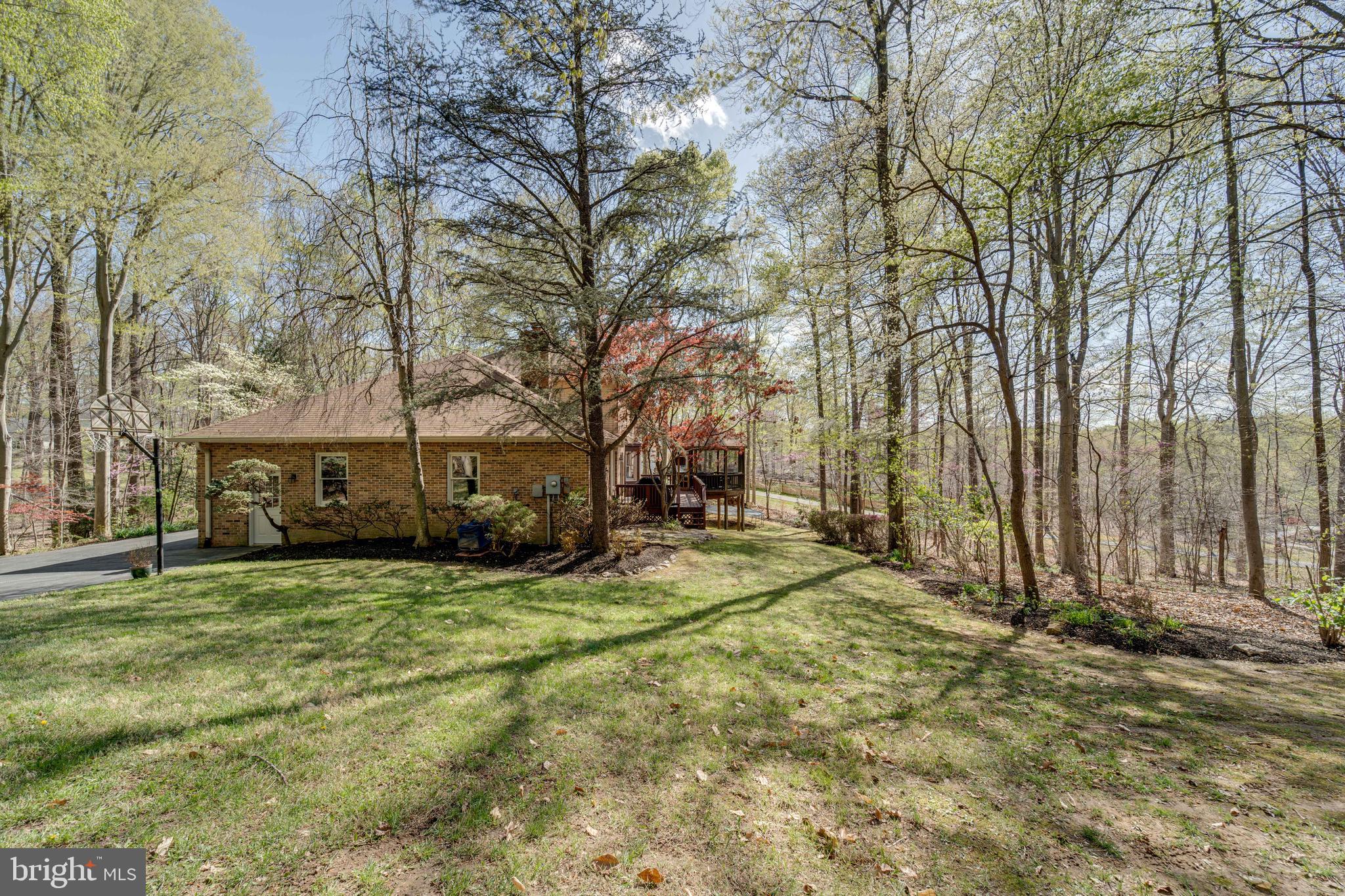 8232 Honeysuckle Road Manassas, VA 20112 - Photo 64 of 76 a view of a house with a yard covered with snow