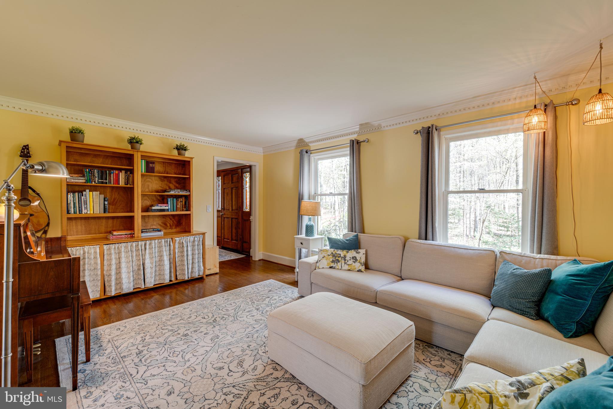 8232 Honeysuckle Road Manassas, VA 20112 - Photo 10 of 76 a living room with furniture and a window