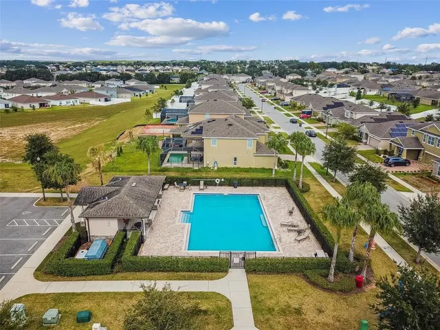 a view of an outdoor space pool patio and mountain view