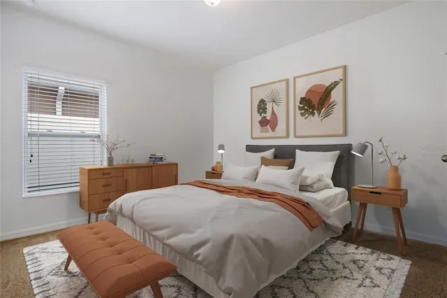 an aerial view of a house with a swimming pool yard and outdoor seating