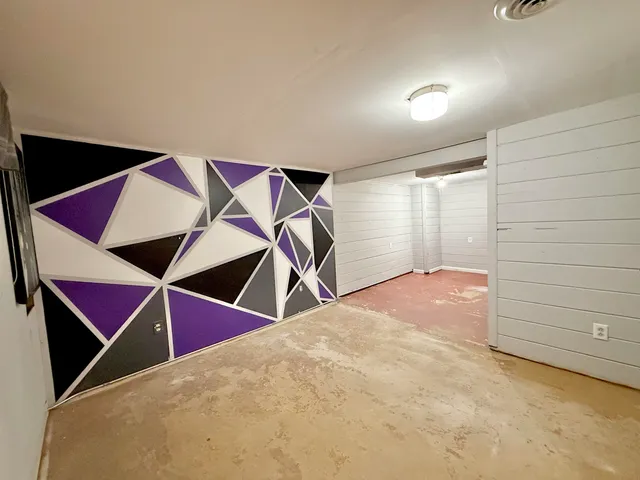 a bedroom with a bed and a walk in closet