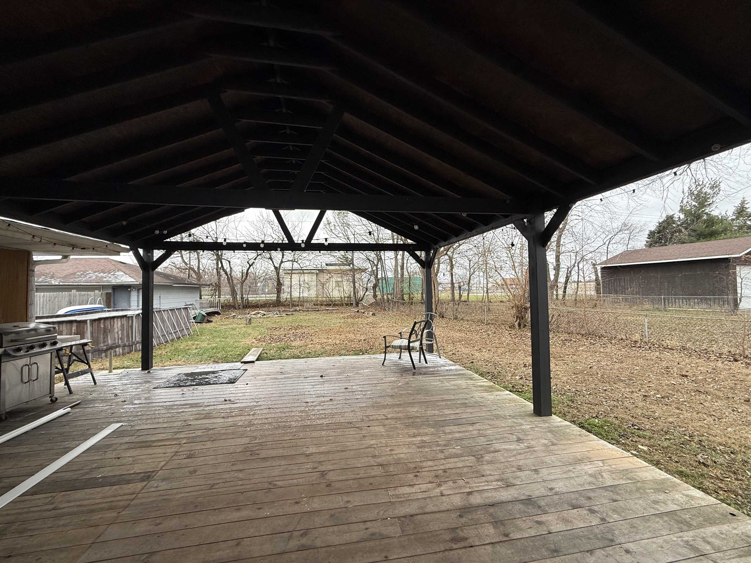 8432 Ravere Street Machesney Park, IL 61115 - Photo 29 of 31 a view of a swimming pool with a porch