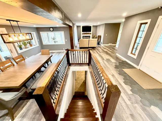 a front view of a house with wooden floor