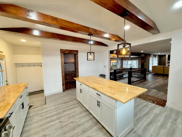 a large spacious bathroom with a large mirror