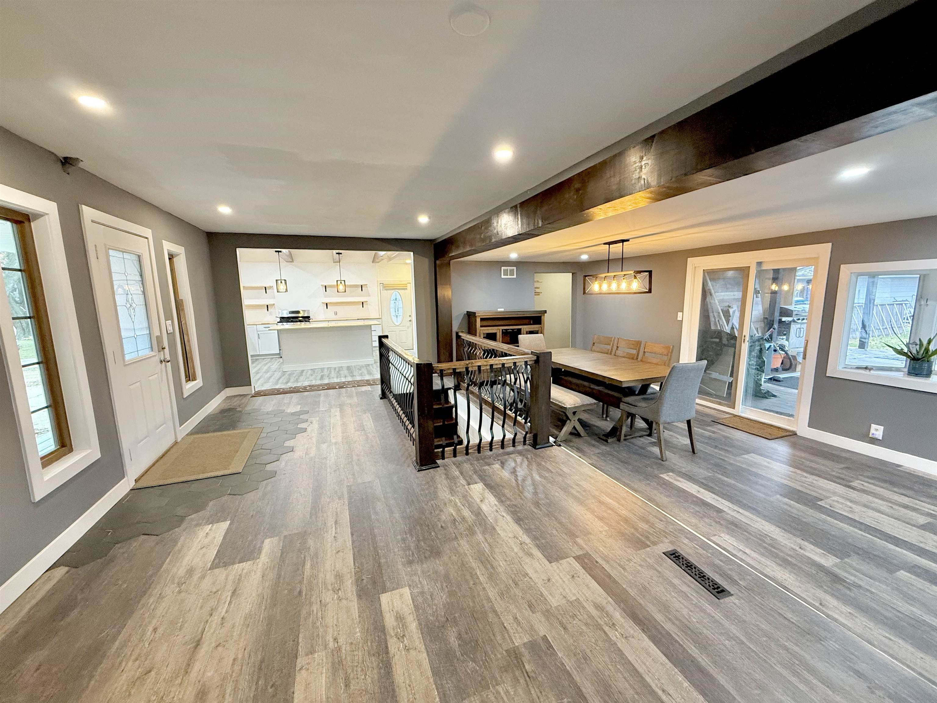 8432 Ravere Street Machesney Park, IL 61115 - Photo 8 of 31 a living room with furniture and a wooden floor