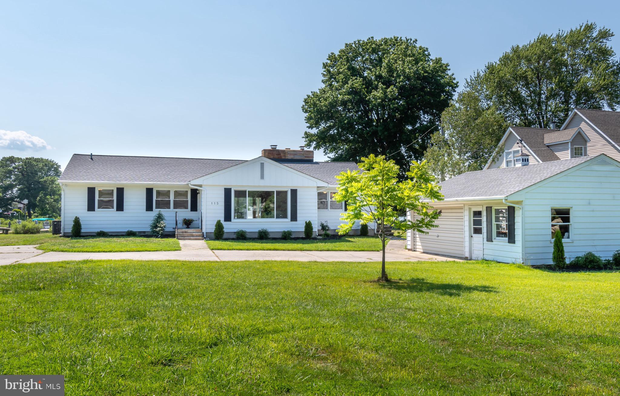 115 Parks Road Chester, MD 21619 - Photo 53 of 54 a front view of house with yard and green space