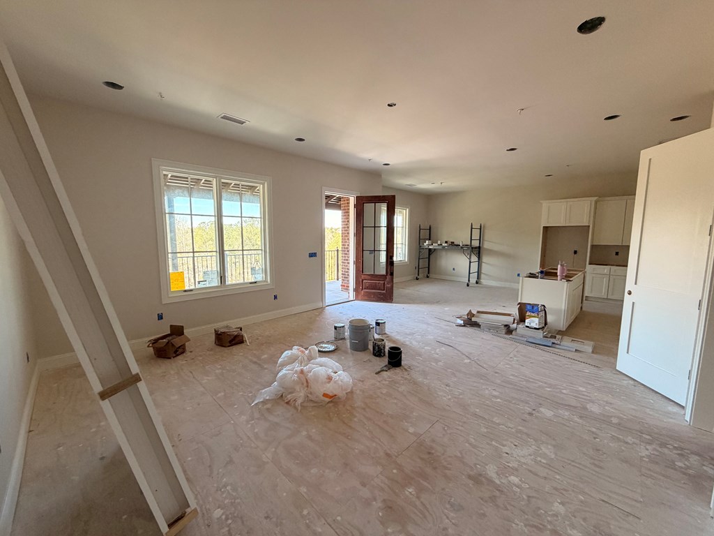 6801 River Road, Unit 406 Columbus, GA 31904 - Photo 3 of 10 a bed room with furniture and a large window