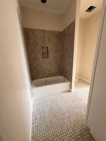 a bathroom with a bathtub