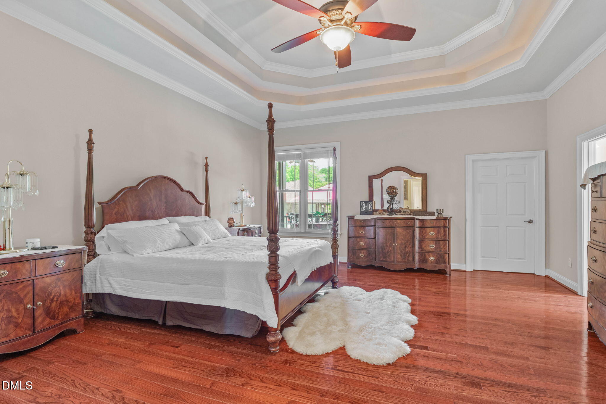 10917 Jordan Road Raleigh, NC 27603 - Photo 6 of 58 a bedroom with a bed dresser and a window