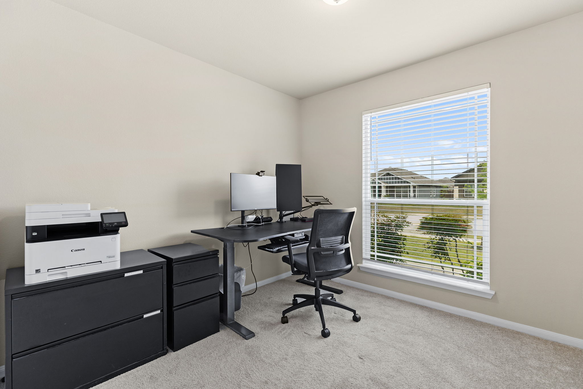 404 Cassandra Drive Hutto, TX 78634 - Photo 27 of 40 Office space with light carpet and baseboards