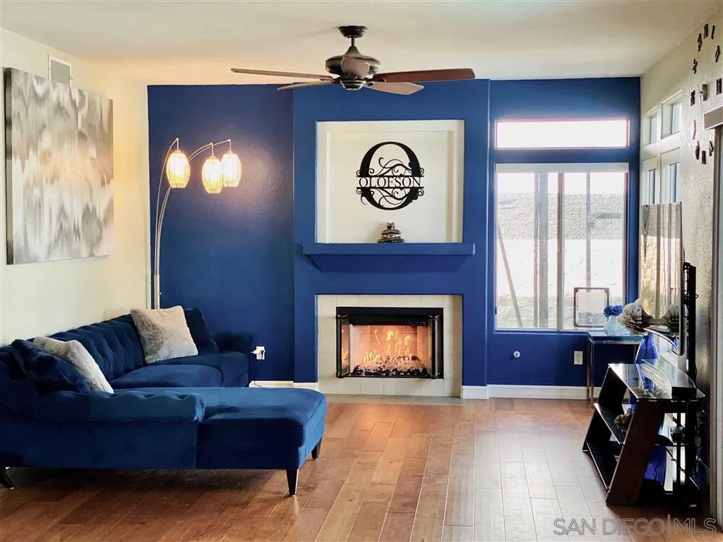 13609 Sunset View Road Poway, CA 92064 - Photo 2 of 15 a living room with furniture and a fireplace