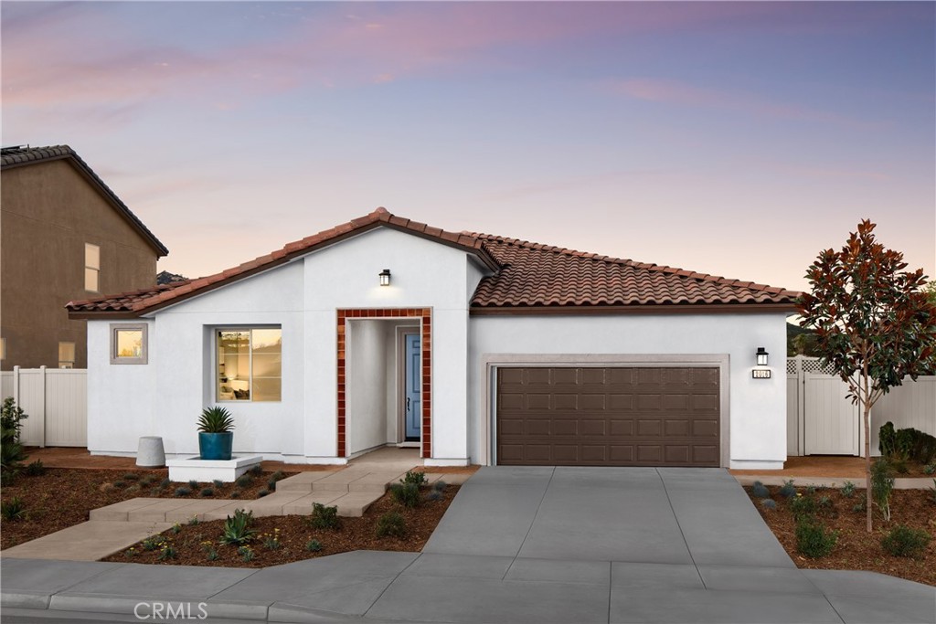 2032 Simpatico Place Escondido, CA 92026 - Photo 14 of 15 a front view of a house with yard and garage