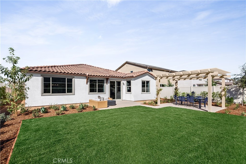 2032 Simpatico Place Escondido, CA 92026 - Photo 15 of 15 a front view of house with a garden