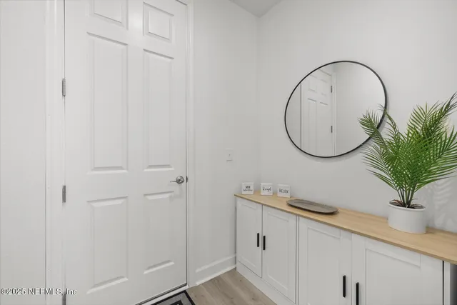 front view of a house with a garden