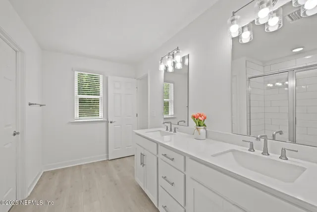 a view of an ocean and city from a balcony