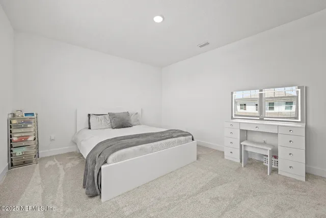 a view of a park with swings and slides