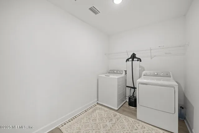 a view of an outdoor space and tennis court