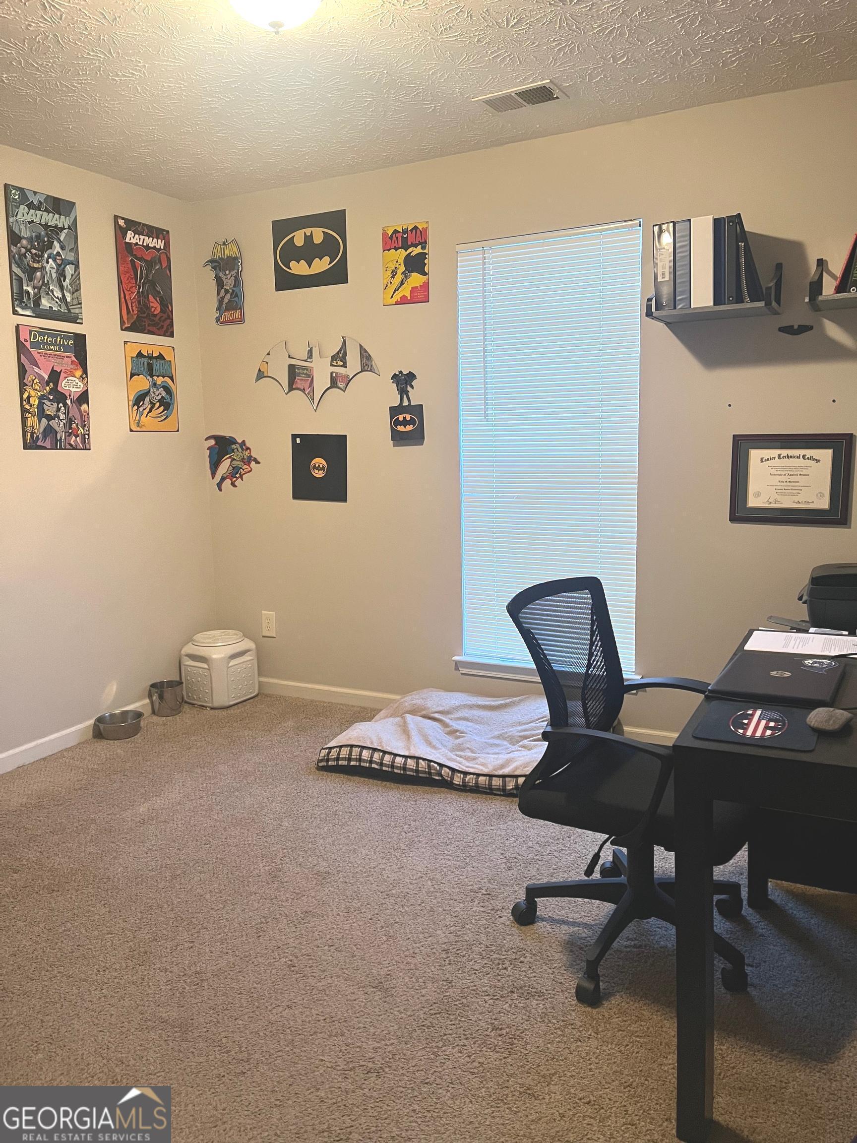 803 Lazy Lane Winder, GA 30680 - Photo 14 of 16 a view of a workspace with a couch