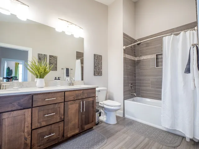 a workspace with furniture and a potted plant