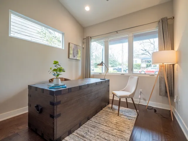 a kitchen with stainless steel appliances granite countertop a stove and a refrigerator