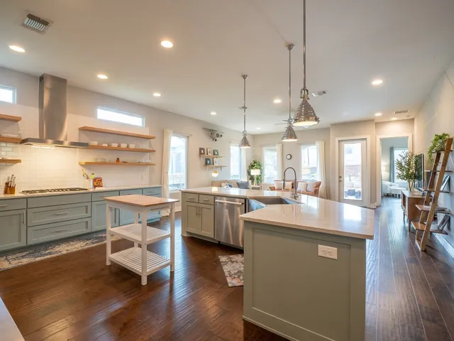 a kitchen with counter space cabinets and appliances