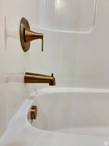 6 South 450th West Gunnison, UT 84634 - Photo 22 of 45 Shower and bathtub combination with bronze-finish fixtures and a single-handle faucet