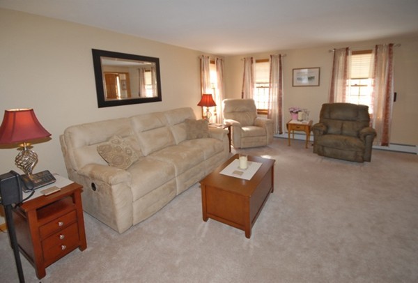 48 Baker Road Salisbury, MA 01952 - Photo 9 of 21 a living room with furniture and a window