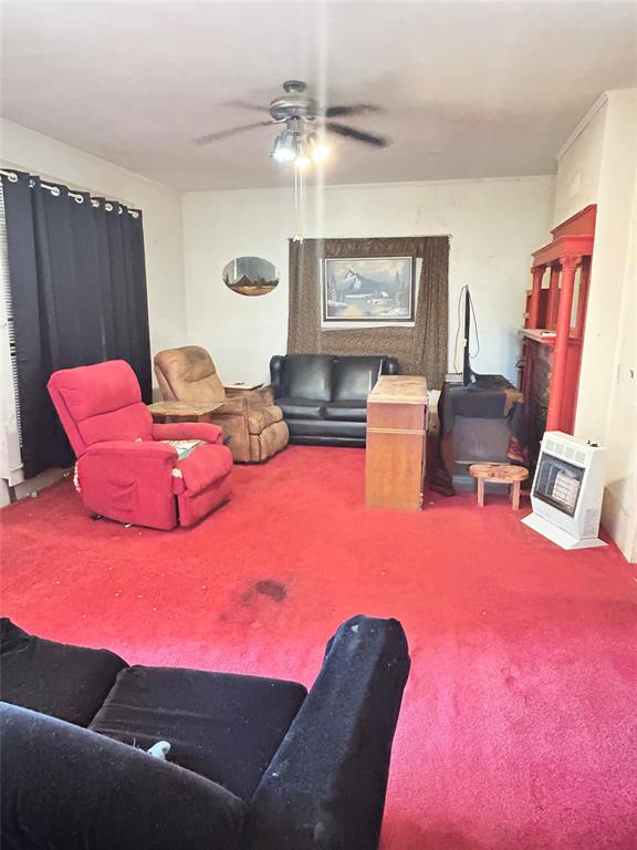 360 North Grafton Street Dublin, TX 76446 - Photo 12 of 24 Another view of your Living Room. Furnitire transfers with the house, including the working heaters.
