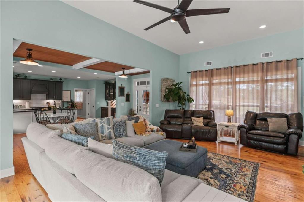 1233 Whooping Creek Road Carrollton, GA 30116 - Photo 13 of 61 a living room with furniture and a large window