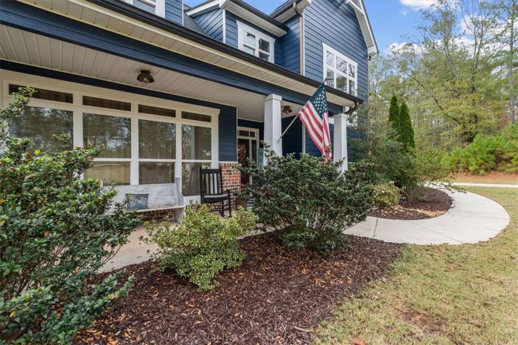 1233 Whooping Creek Road Carrollton, GA 30116 - Photo 2 of 61 a view of a house with a yard