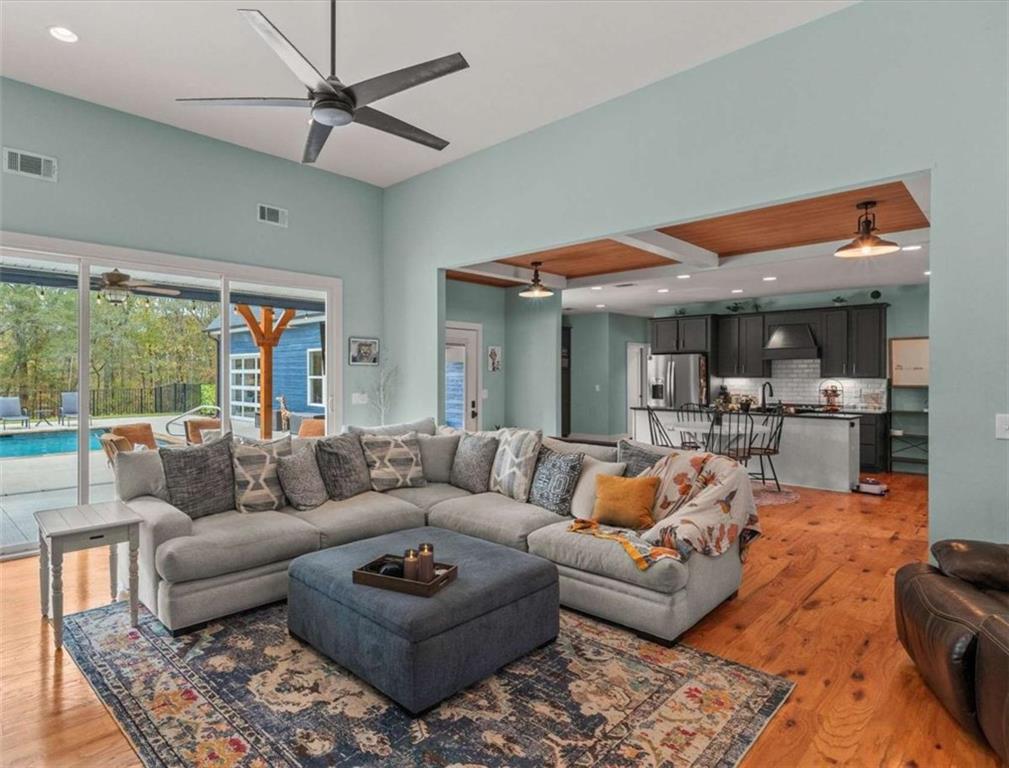 1233 Whooping Creek Road Carrollton, GA 30116 - Photo 4 of 61 a living room with furniture and a large window