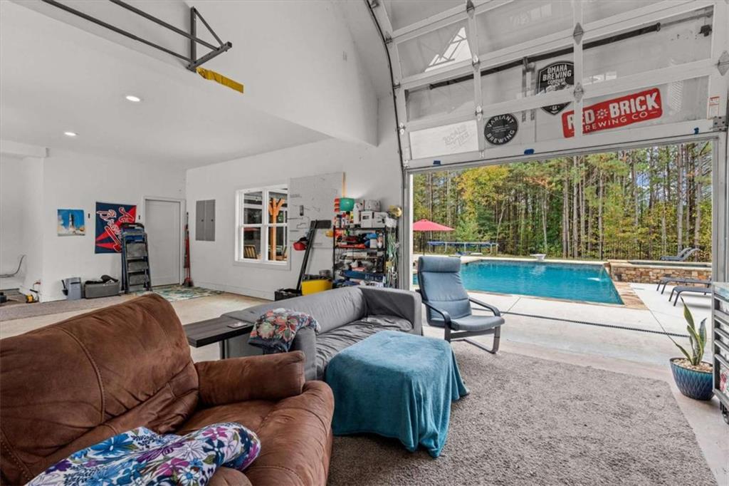 1233 Whooping Creek Road Carrollton, GA 30116 - Photo 52 of 61 a living room with furniture and a large window
