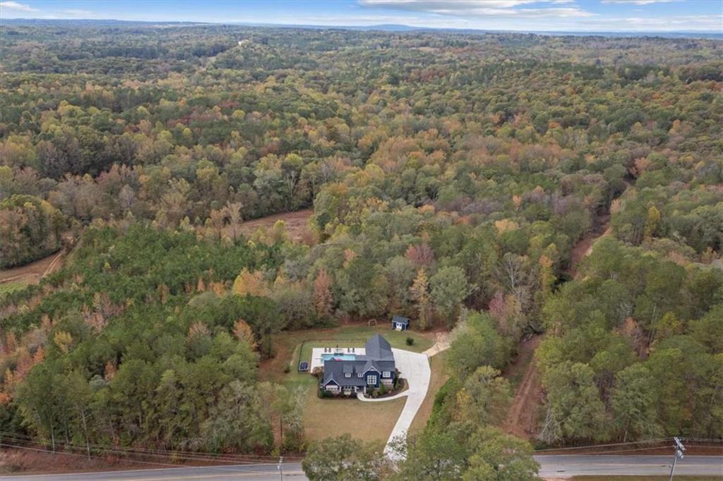 1233 Whooping Creek Road Carrollton, GA 30116 - Photo 58 of 61 a aerial view of a house with a yard