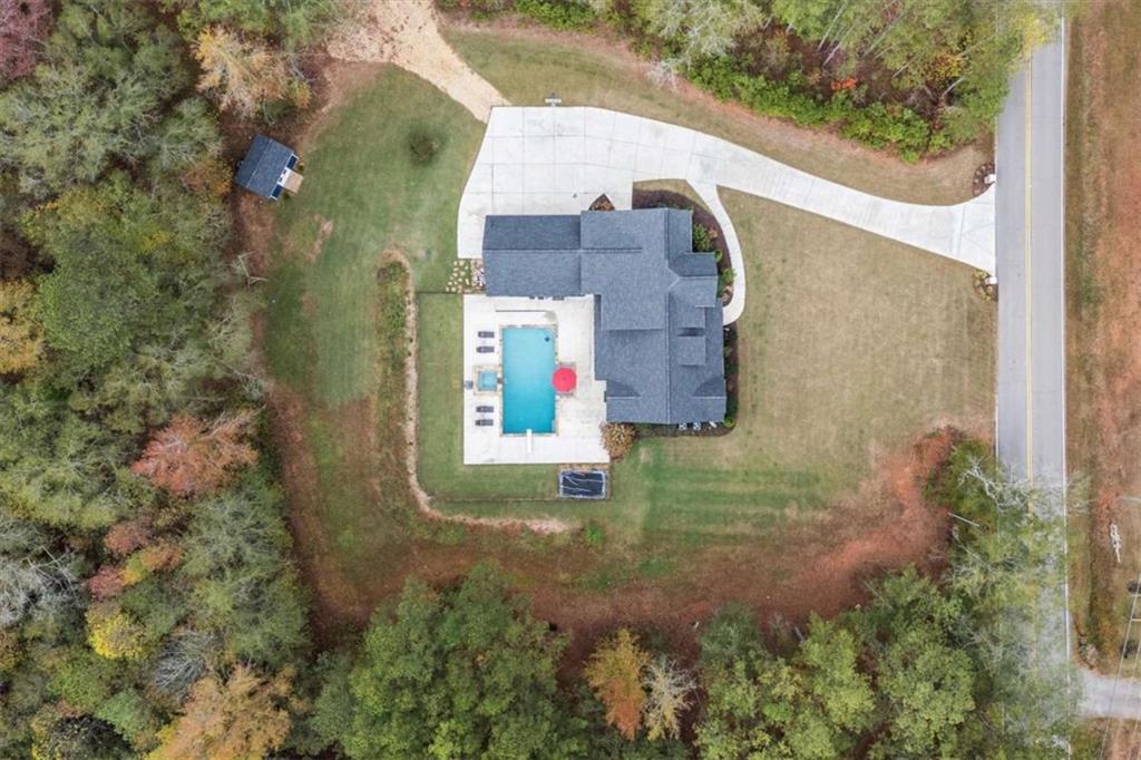 1233 Whooping Creek Road Carrollton, GA 30116 - Photo 60 of 61 an aerial view of residential houses with outdoor space