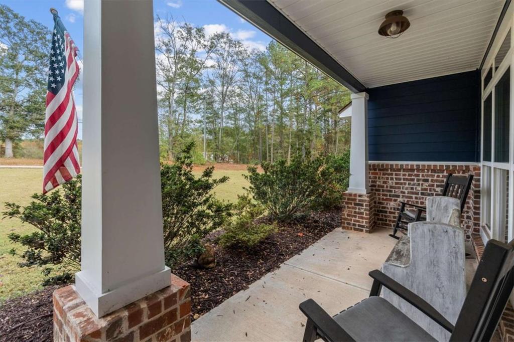 1233 Whooping Creek Road Carrollton, GA 30116 - Photo 10 of 61 a view of balcony with a potted plant