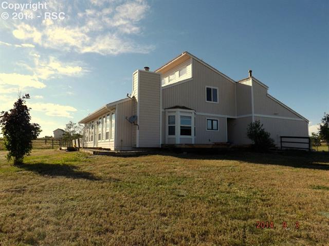 9815 Raygor Road Colorado Springs, CO 80908 - Photo 2 of 17 Side Yard