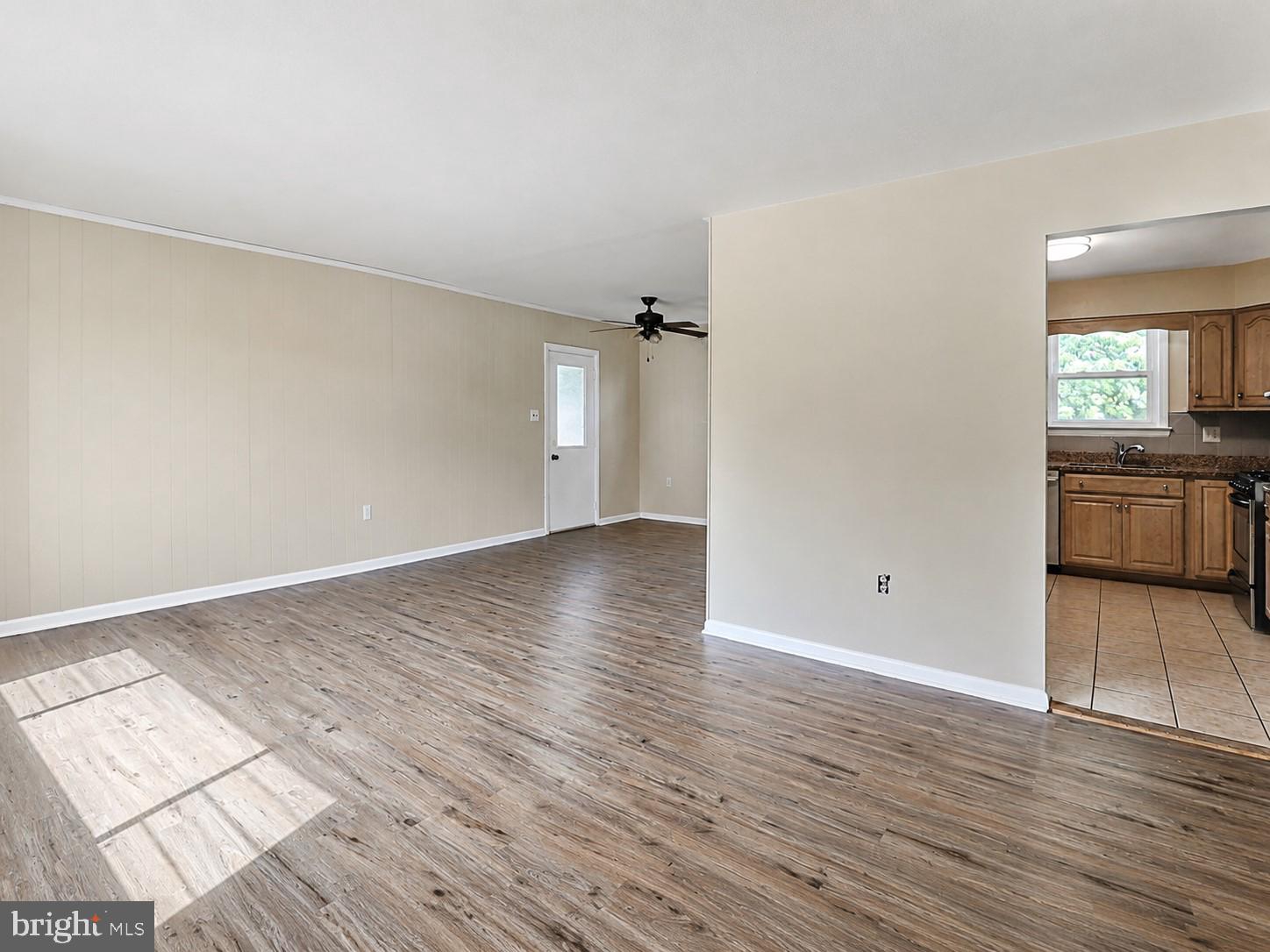 11312 Old Fort Road Fort Washington, MD 20744 - Photo 2 of 13 wooden floor in an empty room