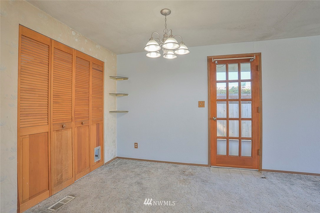3601 Northeast 10th Street Renton, WA 98056 - Photo 12 of 25 a view of an empty room with a window