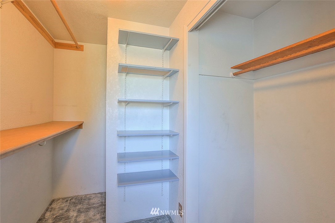 3601 Northeast 10th Street Renton, WA 98056 - Photo 14 of 25 a view of walk in closet with empty racks