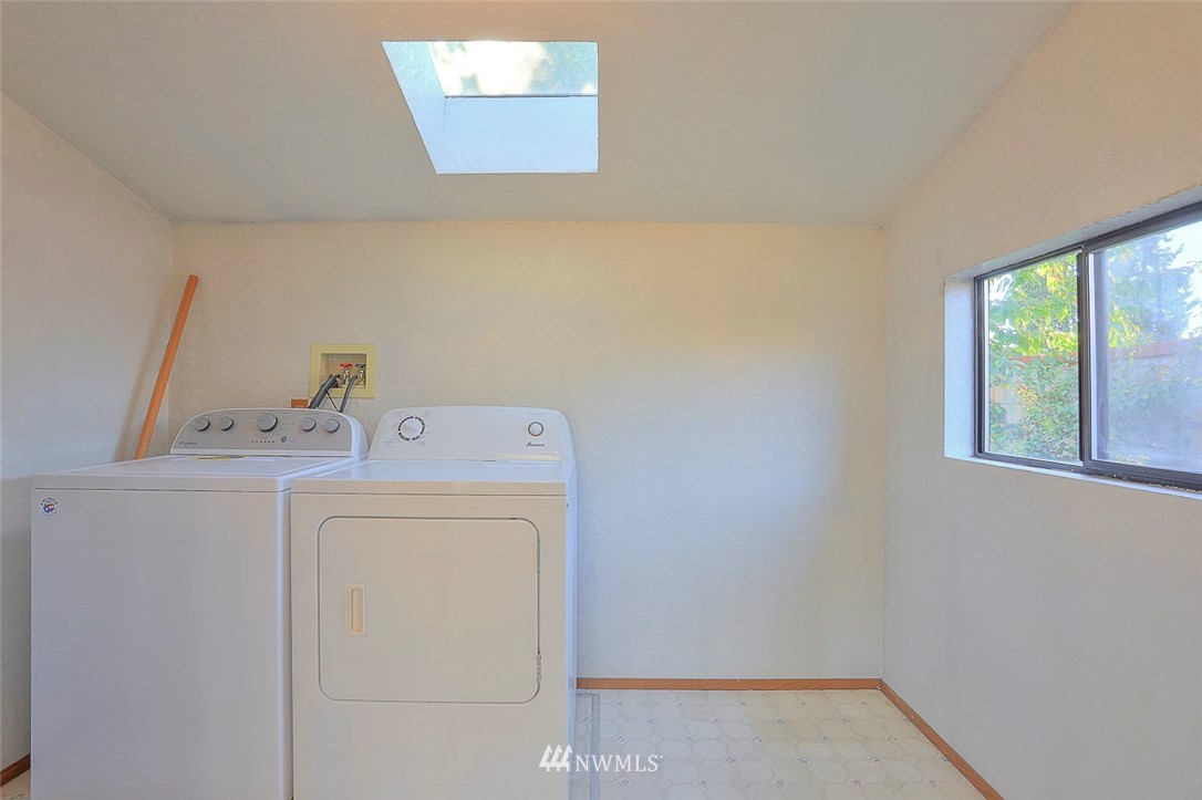 3601 Northeast 10th Street Renton, WA 98056 - Photo 25 of 25 a utility room with dryer and washer