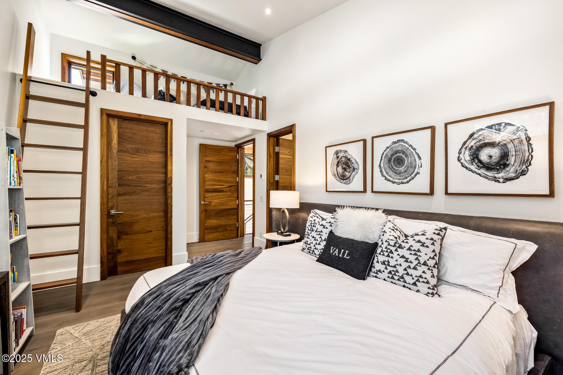 2470 Bald Mountain Road Vail, CO 81657 - Photo 18 of 29 a bedroom with a bed and a walk in closet