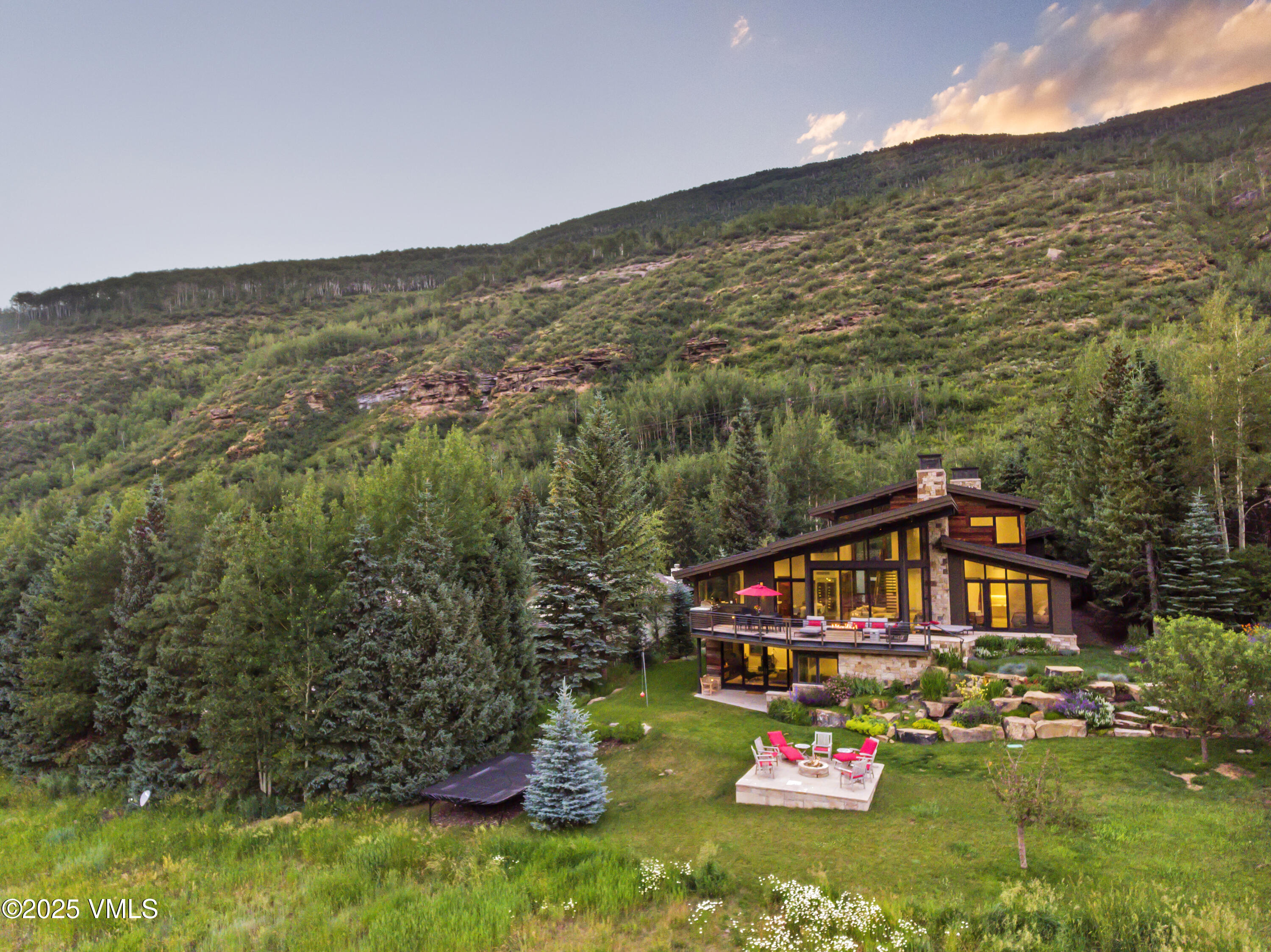 2470 Bald Mountain Road Vail, CO 81657 - Photo 5 of 29 a outdoor view of a house with a yard