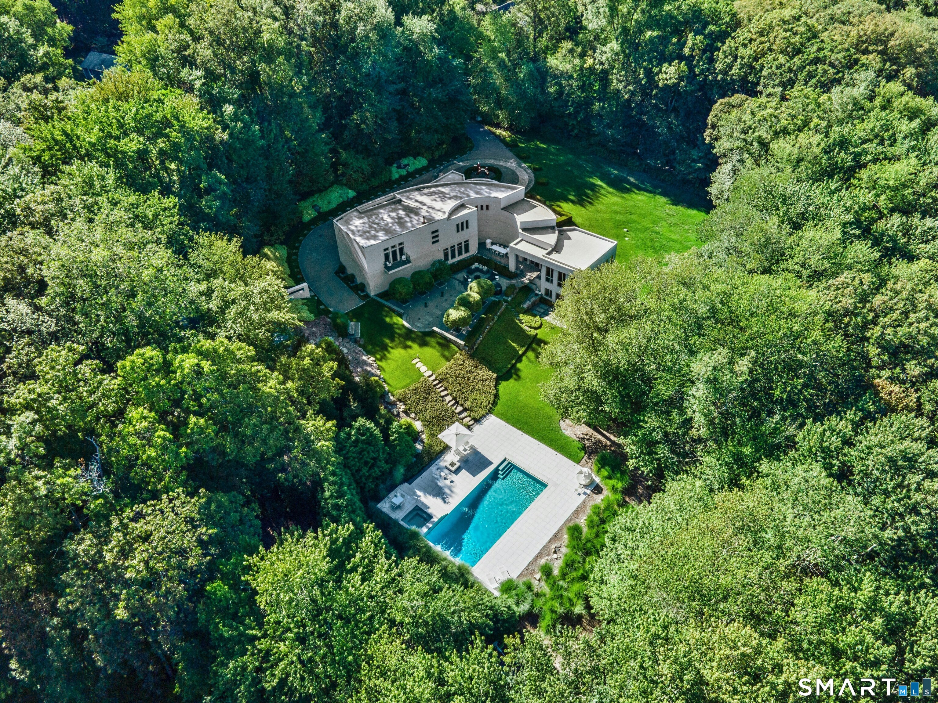 300 Sturges Ridge Road Wilton, CT 06897 - Photo 40 of 40 an aerial view of a house with a yard basket ball court and outdoor seating