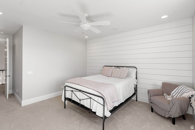 2917 Old Farm Road Washington, UT 84780 - Photo 74 of 105 Bedroom with recessed lighting, light colored carpet, ceiling fan, and wooden walls