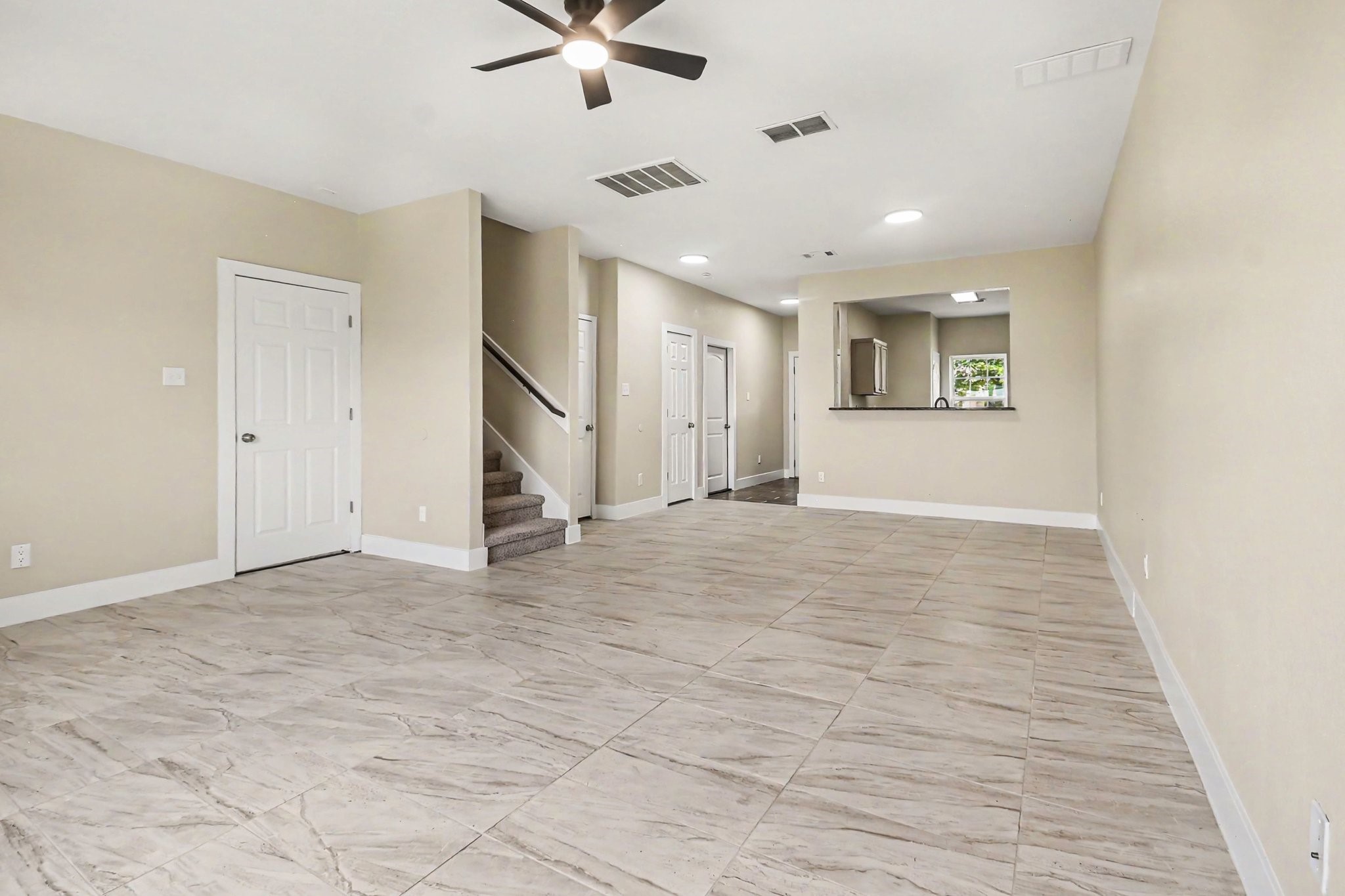 1322 Diamond Drape Drive Rosharon, TX 77583 - Photo 6 of 45 a view of an empty room with a window