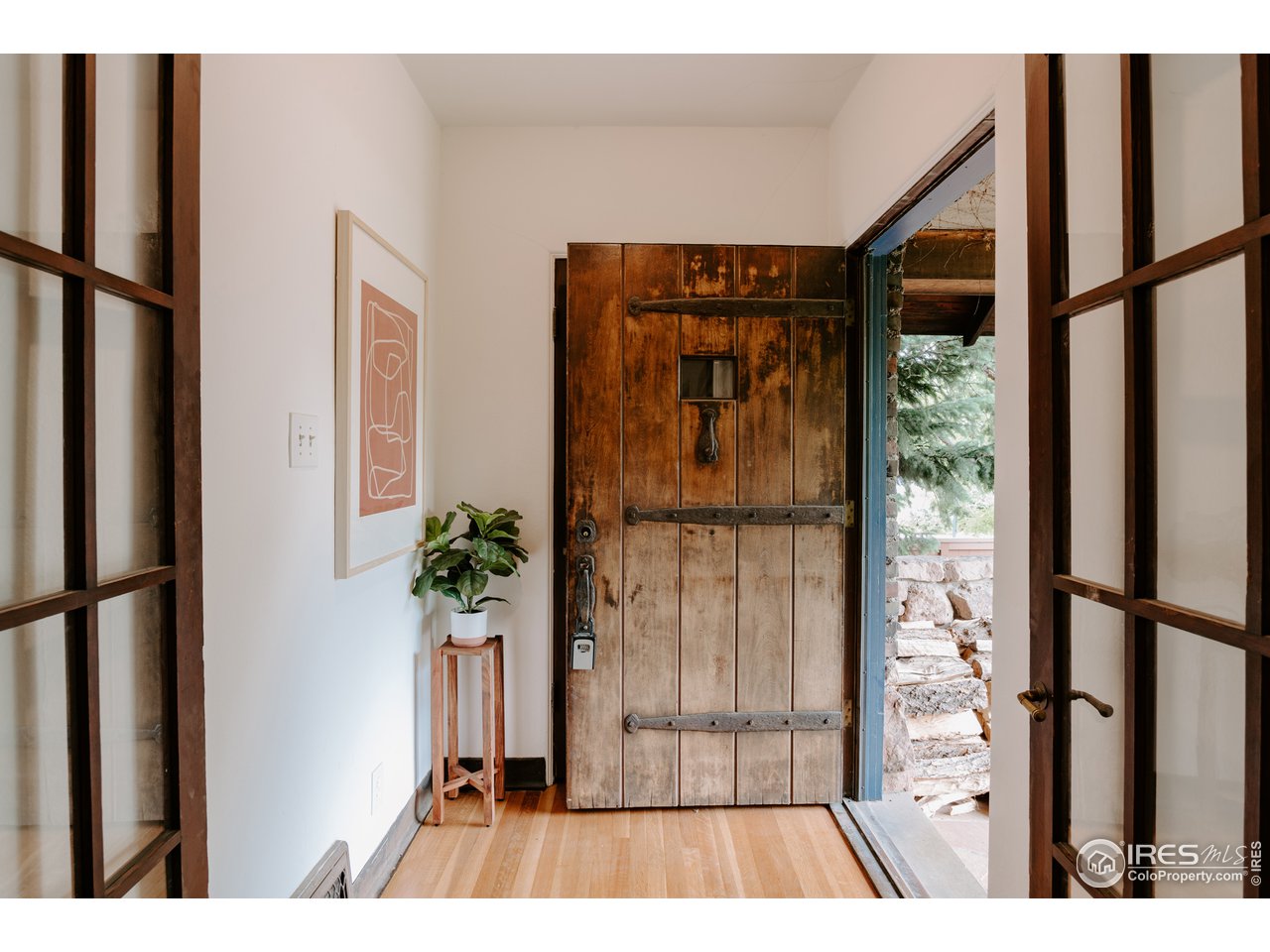1188 Forest Avenue Boulder, CO 80304 - Photo 3 of 38 The striking front door welcomes you home
