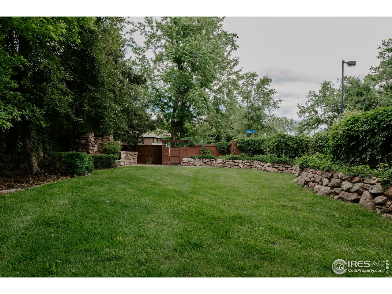 1188 Forest Avenue Boulder, CO 80304 - Photo 34 of 38 Fully fenced and wooded yard creates your own private oasis in the heart of the city