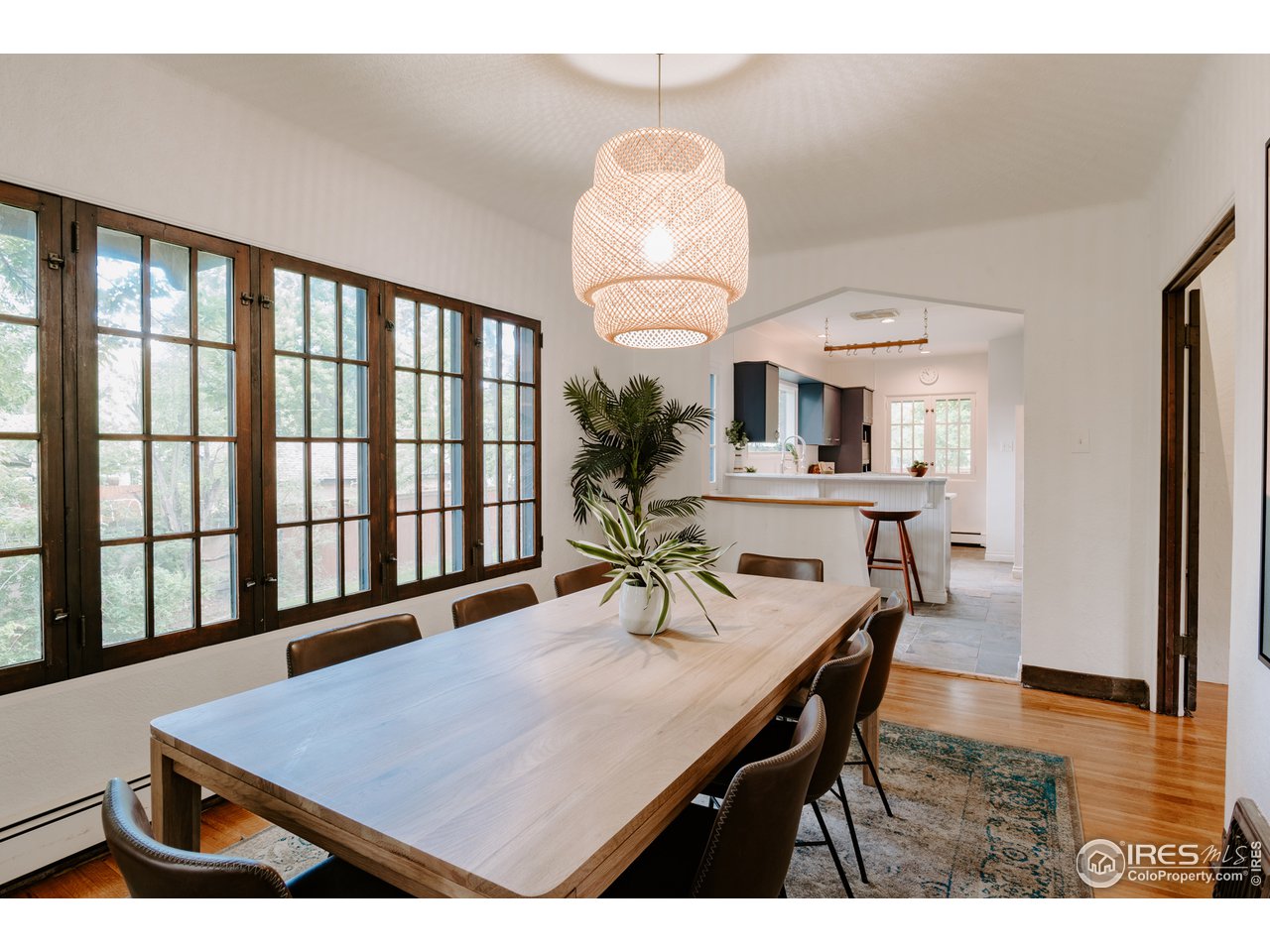 1188 Forest Avenue Boulder, CO 80304 - Photo 6 of 38 The bright, spacious dining area connects the living room and kitchen