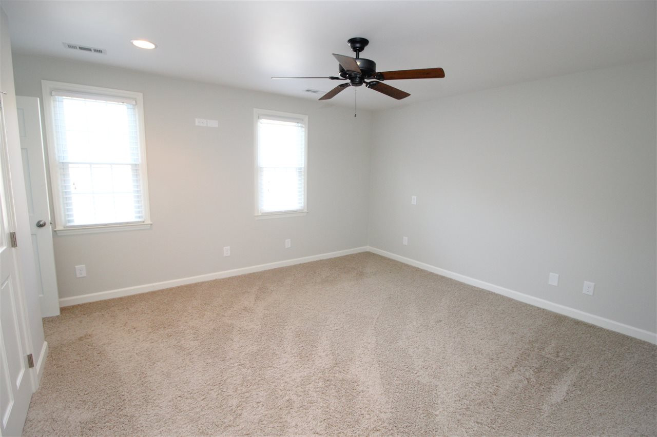6332 Jones Farm Road Wake Forest, NC 27587 - Photo 15 of 28 Master bedroom full of light with newer carpet! Master Bedroom